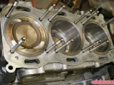 Lower end with pistons and O ring grooves