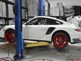 Red Agency Power Niche Wheels with Toyo R888 tires on Porsche 997 Turbo