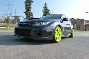 Subaru STI Gramlight 57D and APR Carbon Brake Ducts