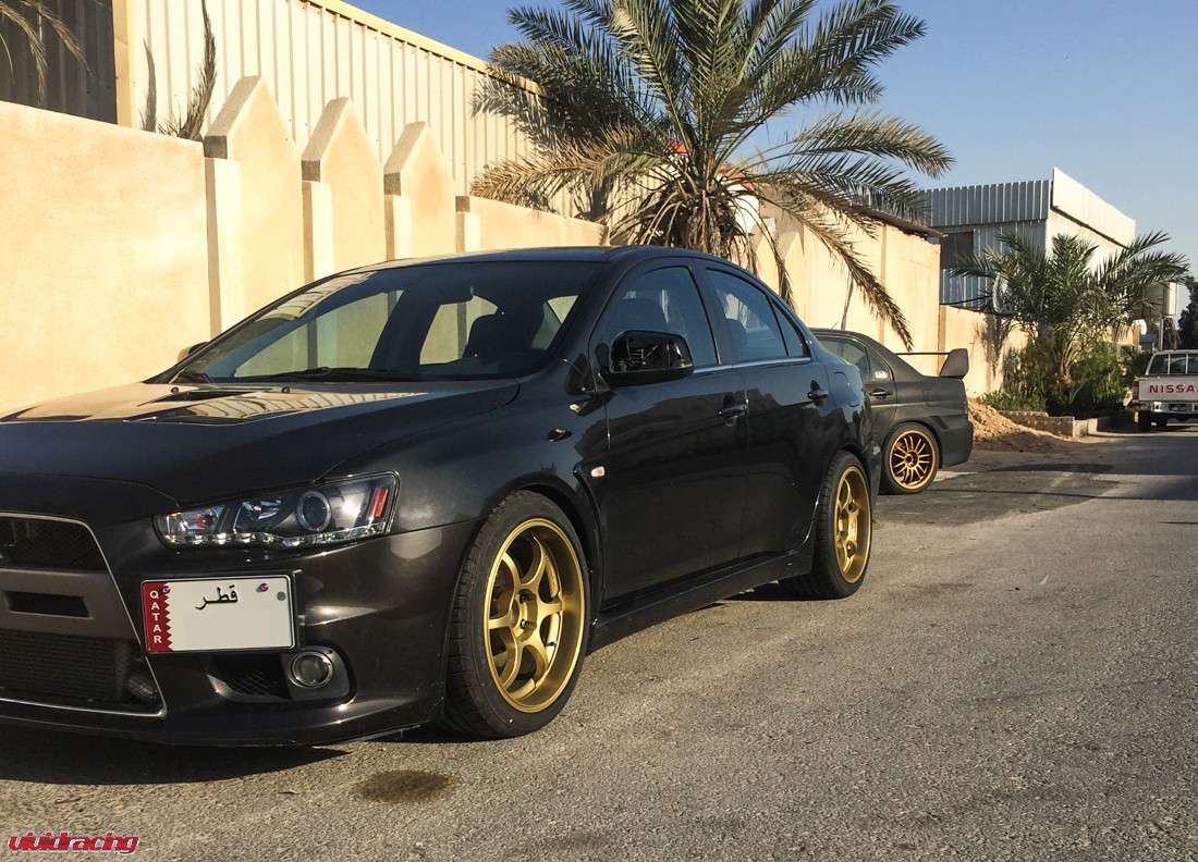 Mitsubishi Evo on 18″ Gold Advan RG-D Wheels