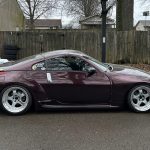 Nissan-350Z-2004-featured-b1b6d6ce-e5ce-48e4-8579-b3d143a00919-1719879149.jpeg 2004 Nissan 350Z Vivid Racing modifications