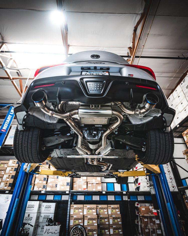 Undershot of Toyota Supra’s performance exhaust system.