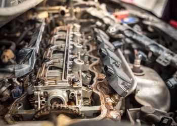 A used cylinder head with the valve cover removed