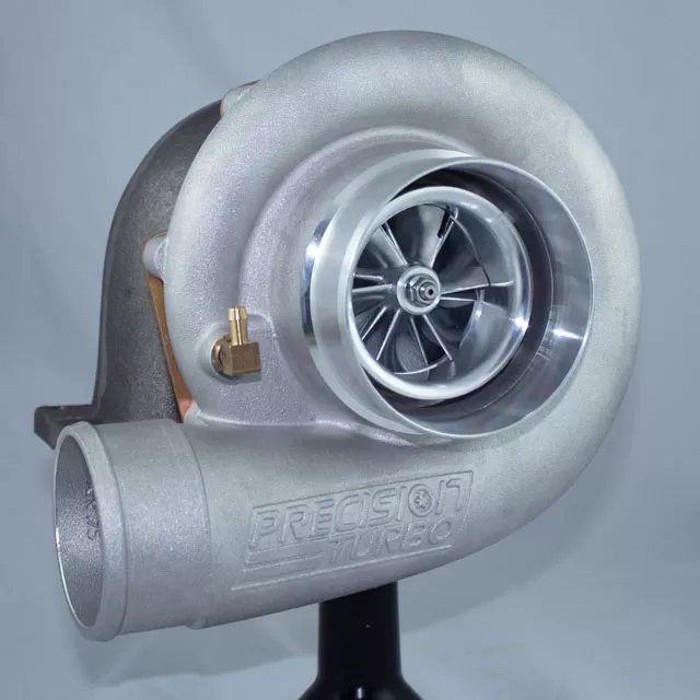 Precision Turbo & Engine PT6776 MFS JB SP CC w/ T3 Inlet/5-Bolt Discharge w/ HOLE .63 A/R - 31504008189