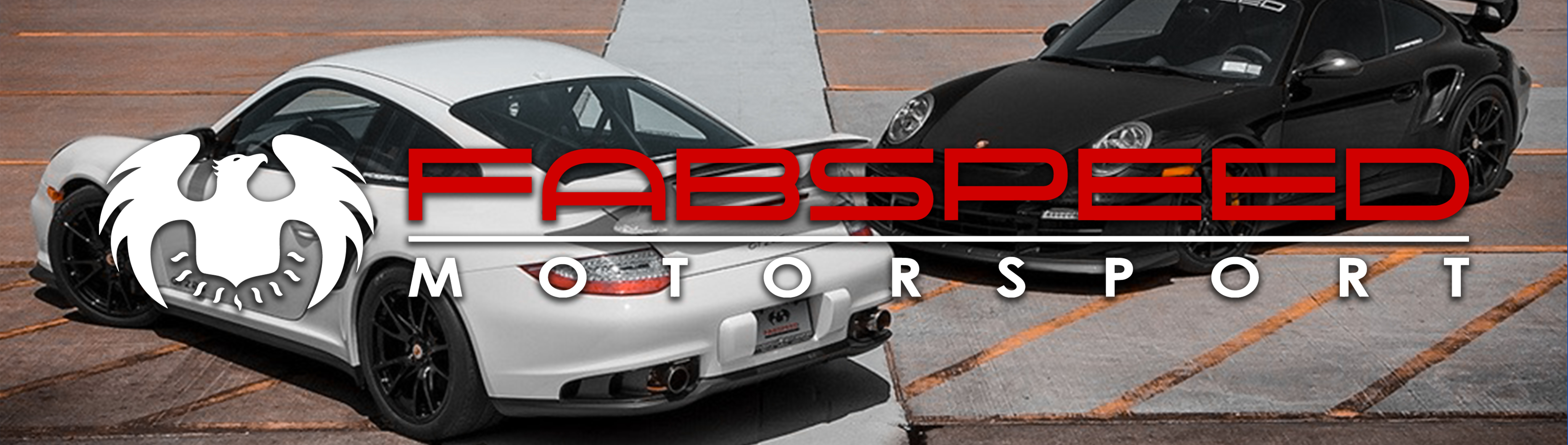 White 997 Porsche and Black 997 Porsche with FabSpeed Logo in center